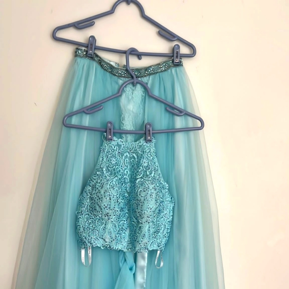 Two piece prom dress ,top is halter back necklace, fully beaded bodice.
